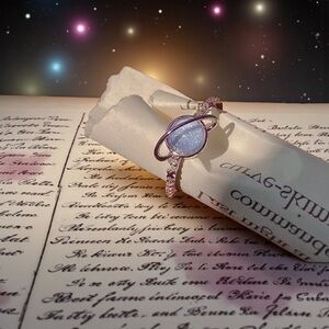 Gorgeous Silver Planet Ring with Blue Stone